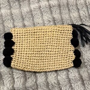 Woven Straw Clutch with Black Pom Poms
